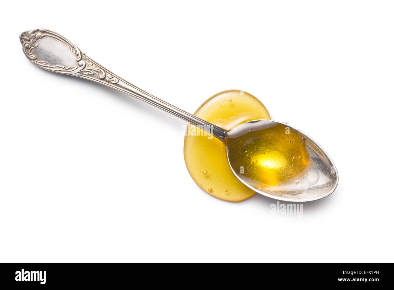 Cucchiaio d'argento con miele Immagini senza sfondo e Foto Stock ritagliate  - Alamy