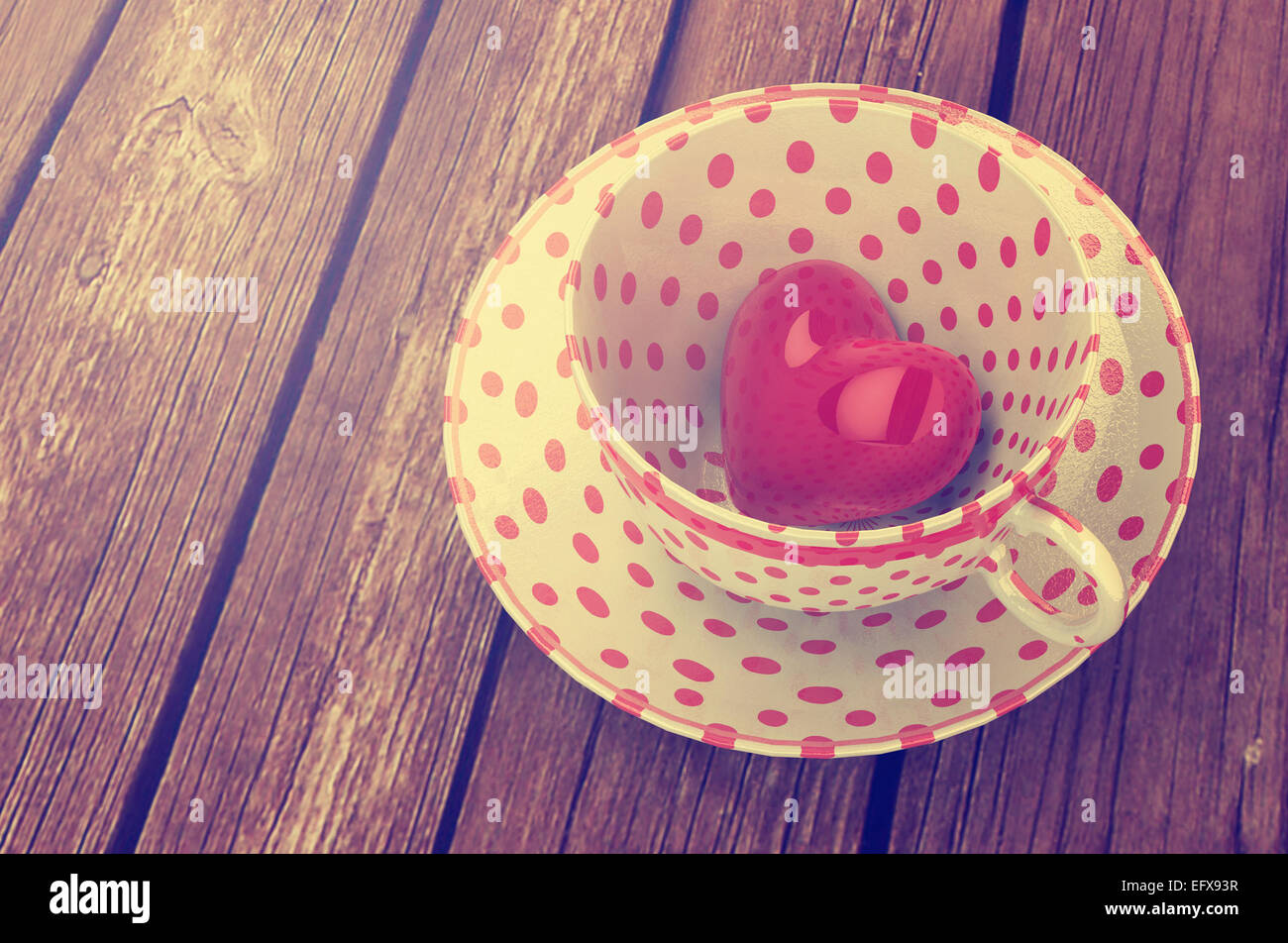 Cuore rosso nella tazza da tè,il giorno di San Valentino sfondo Foto Stock