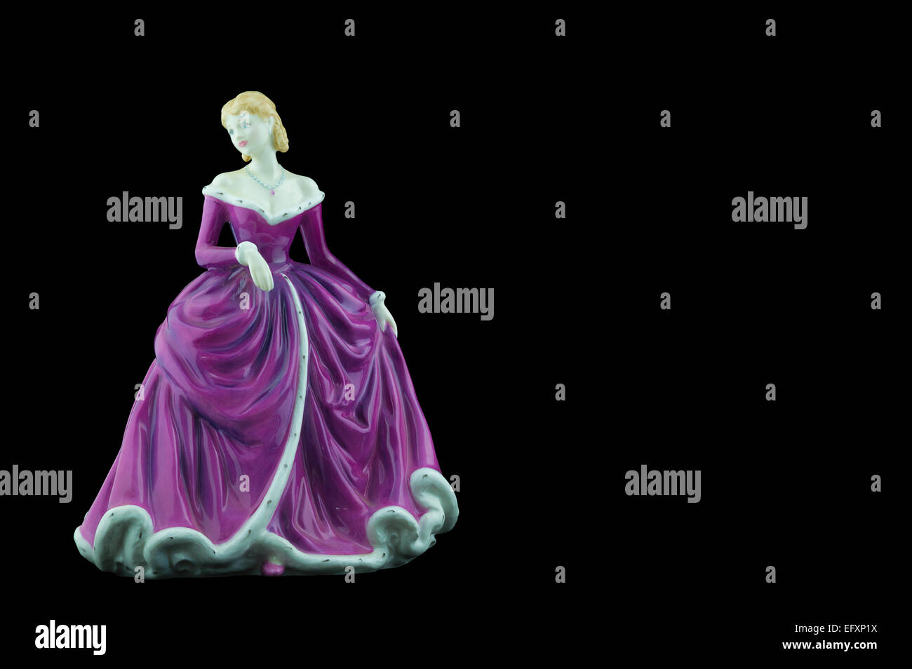 Bone China figurina che indossa un vestito viola Foto Stock