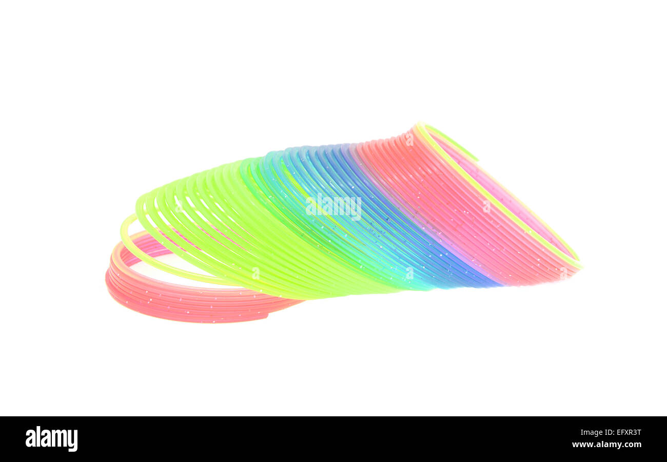 Multi-Colored Arcobaleno giocattolo a molla isolato Foto Stock