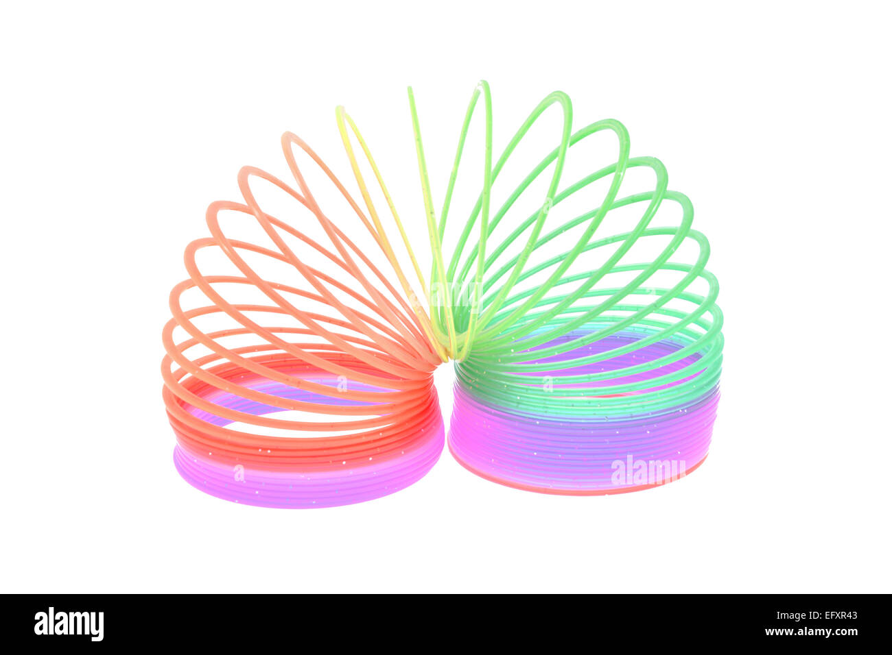 Multi-Colored Arcobaleno giocattolo a molla isolato Foto Stock