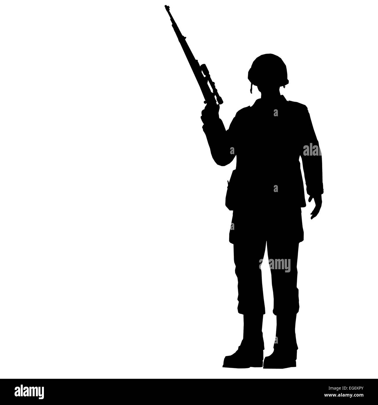 Silhouette di un giovane soldato nel casco militare Foto Stock