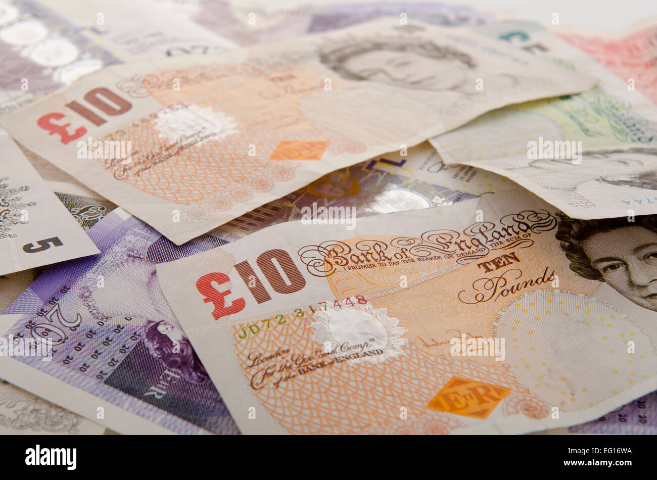 Money uk immagine di sfondo di banconote britanniche assortite Foto Stock