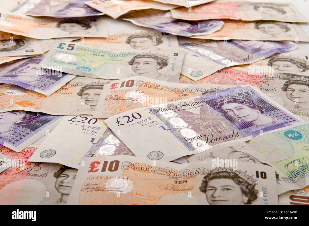 Money uk immagine di sfondo di banconote britanniche assortite Foto Stock