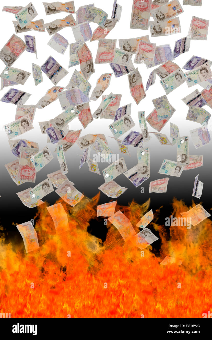 Concetto di immagine del british banconote cadere nel fuoco Foto Stock
