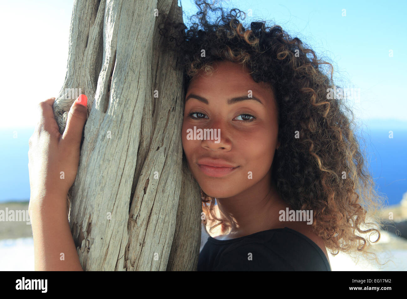 La Grecia una giovane razza mista ragazza in posa in vacanza Foto Stock