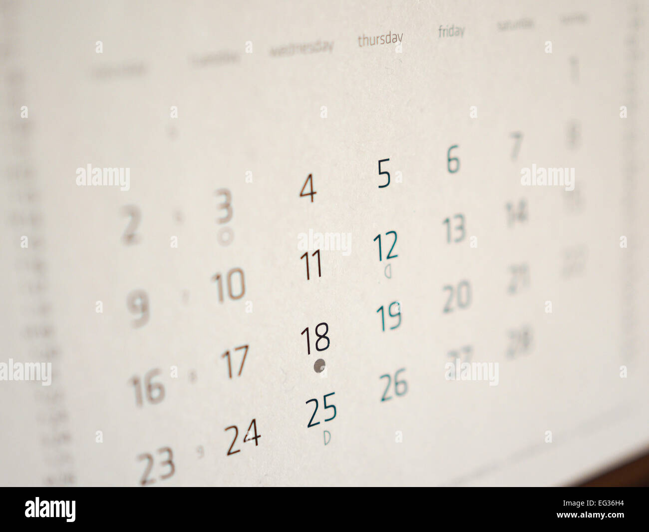 Dettaglio di una pagina di un calendario con le date Foto Stock