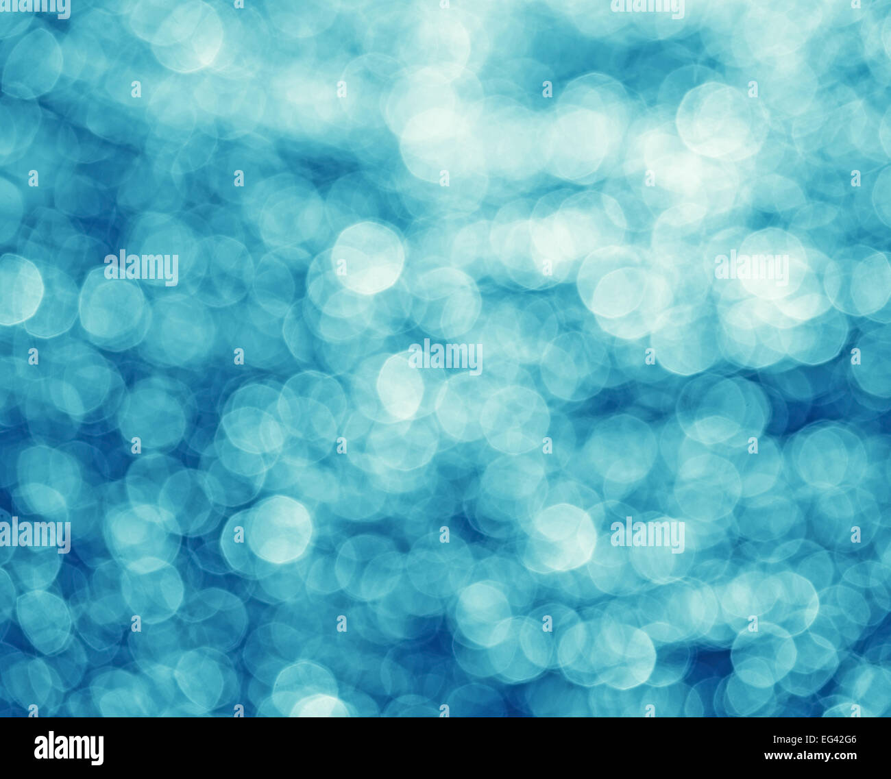 Abstract sfondo costituito di acqua riflessione bokeh cerchi. Foto Stock