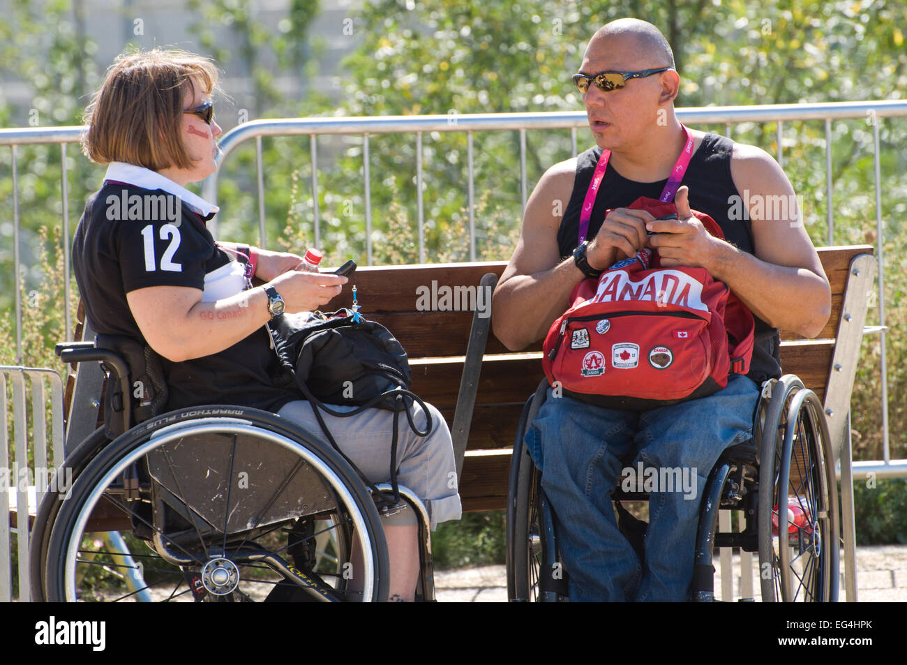 Due persone canadesi in carrozzina, Parco Olimpico di Londra - Inghilterra Foto Stock