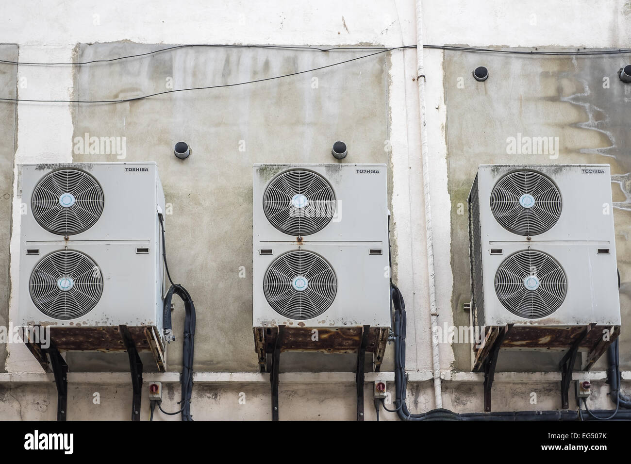 Unità di condizionamento sul retro di un edificio. Foto Stock