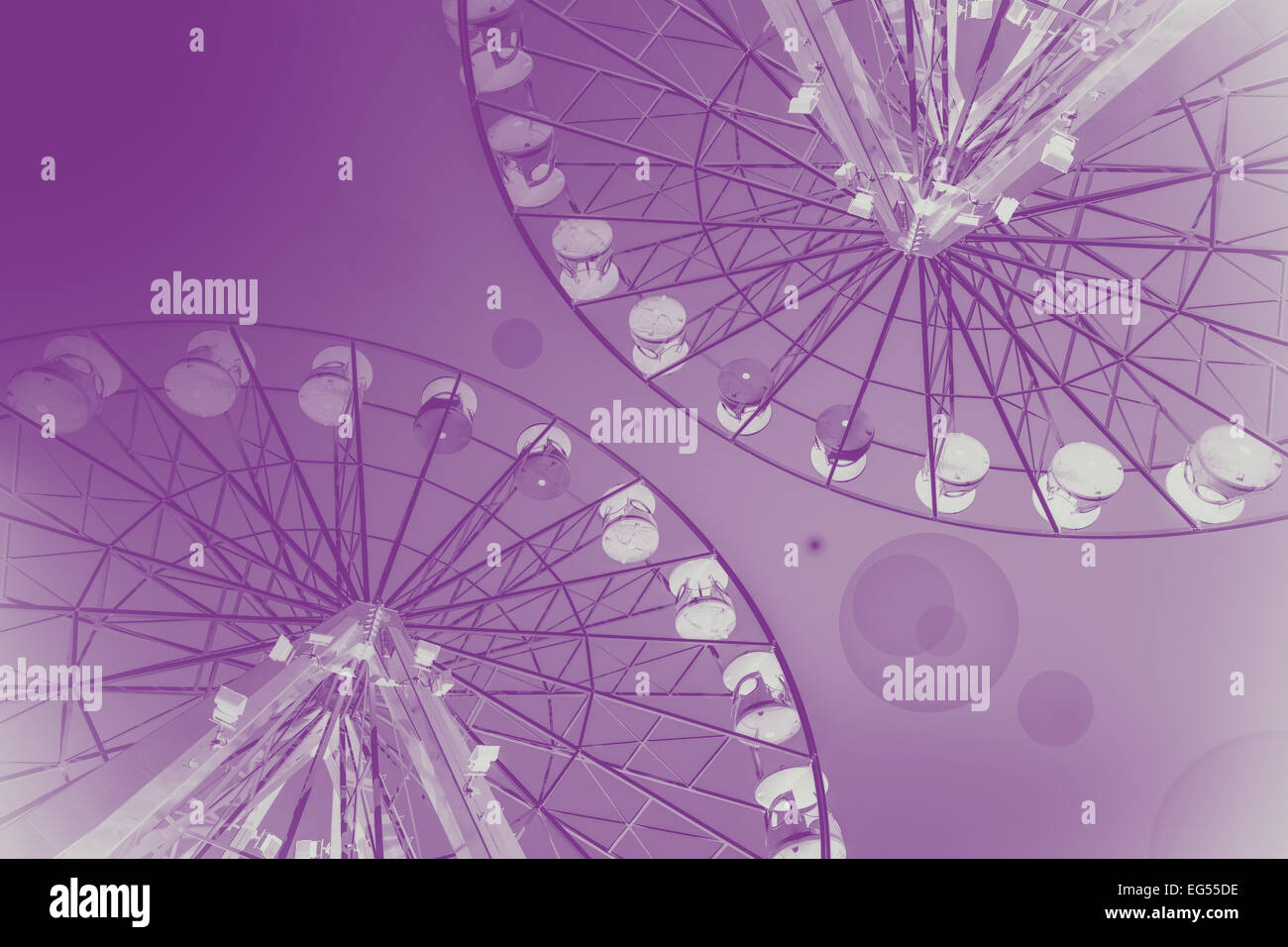 Rosa sfondo astratta fatta di Ferris ruote. Foto Stock