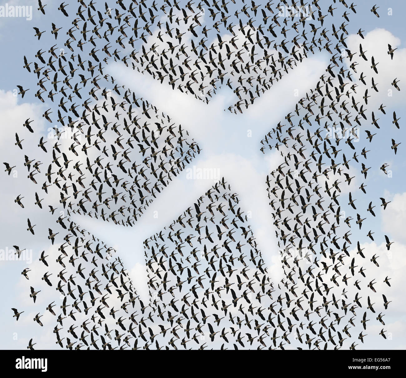Aria concetto di viaggio come uno stormo di uccelli in volo o di oche organizzati in forma di un passeggero aereo jet come un trasporto aereo e il trasporto simbolo. Foto Stock