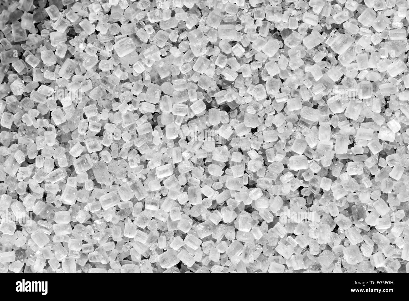Zucchero bianco vista superiore dello sfondo. Un close-up, macro shot. Foto Stock