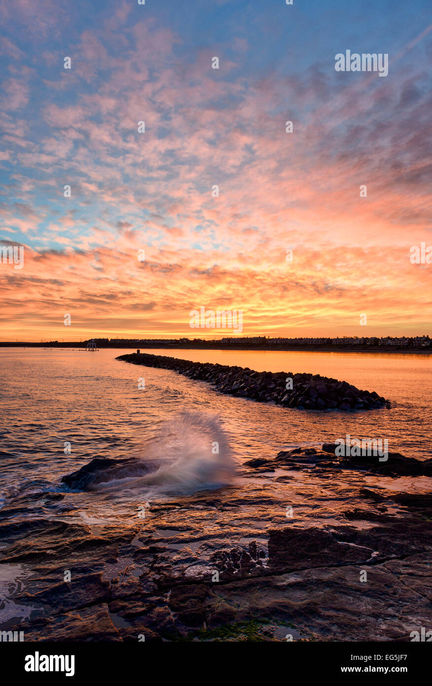 Tramonto a Newbiggin dal mare Foto Stock