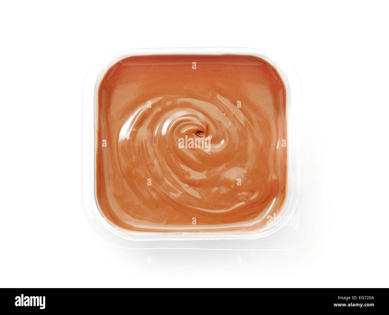 Il cioccolato liquido pasta su bianco Foto Stock