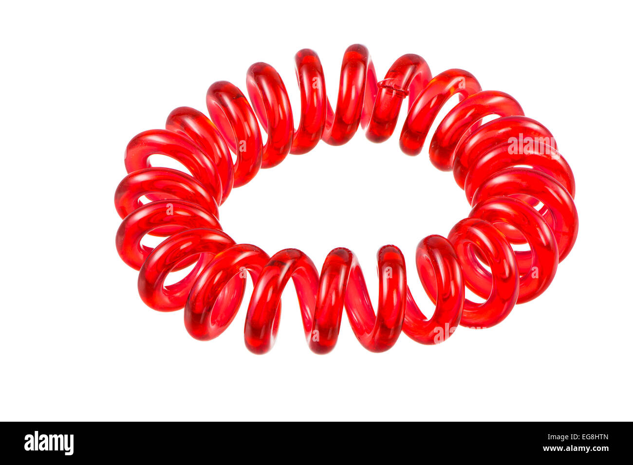 Eelastic spirale rosso hari tirante isolato su bianco Foto Stock