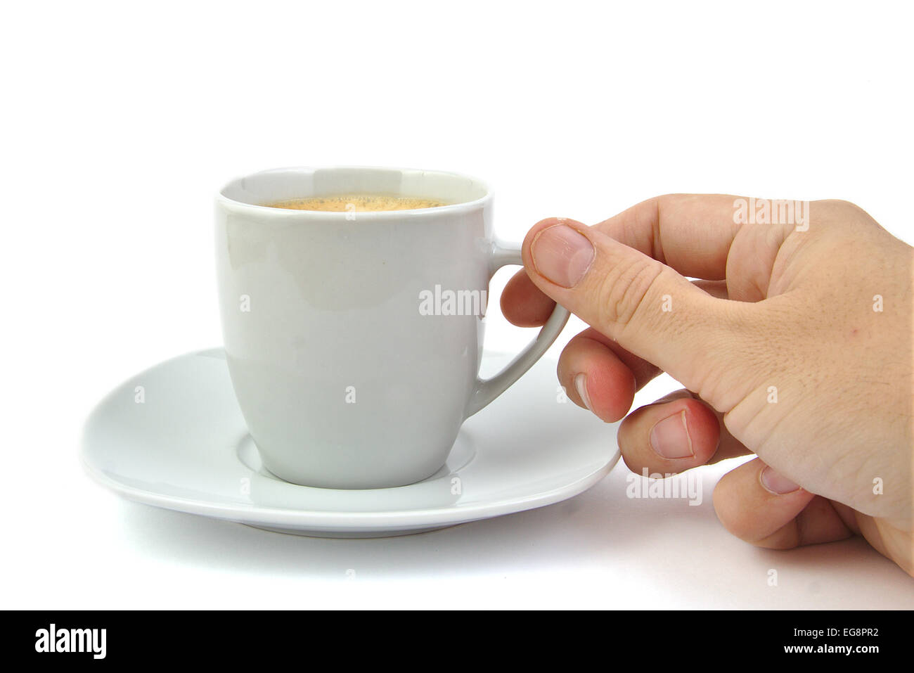 Mano e una tazza di caffè in backgroud luminoso Foto Stock
