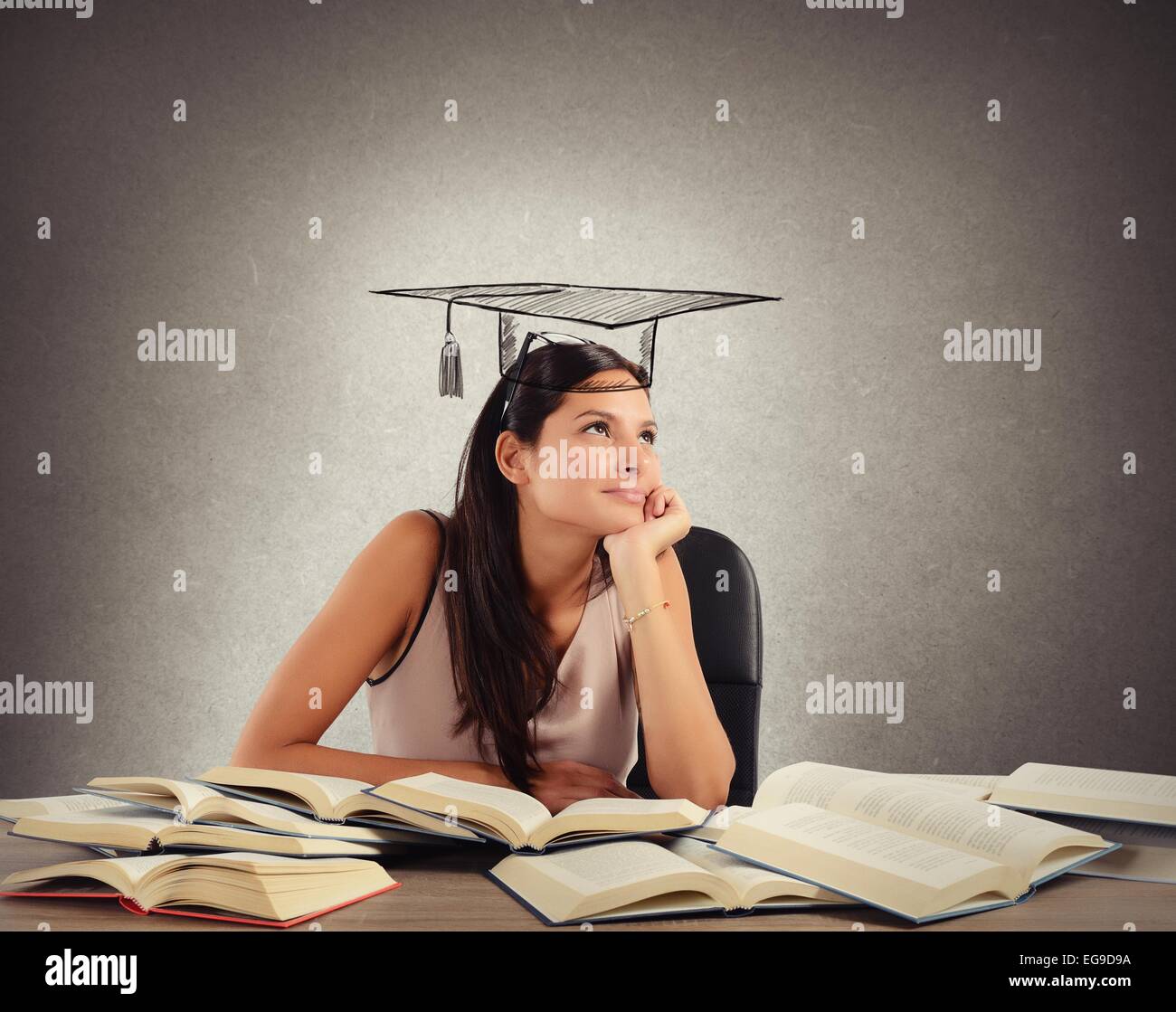 Studente sogni graduazione Foto Stock