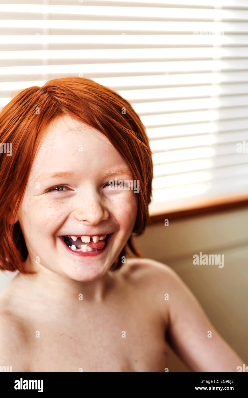 Ritratto di sorridere redhead boy Foto Stock