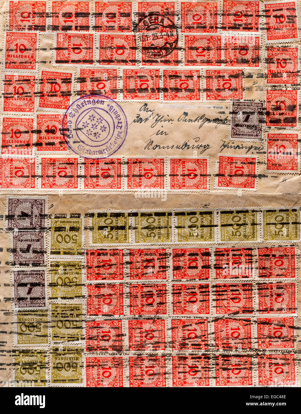 1923 Lettera tedesca con 10,000,000,000 segni di "iper-inflazione" francobolli - Germania. Foto Stock