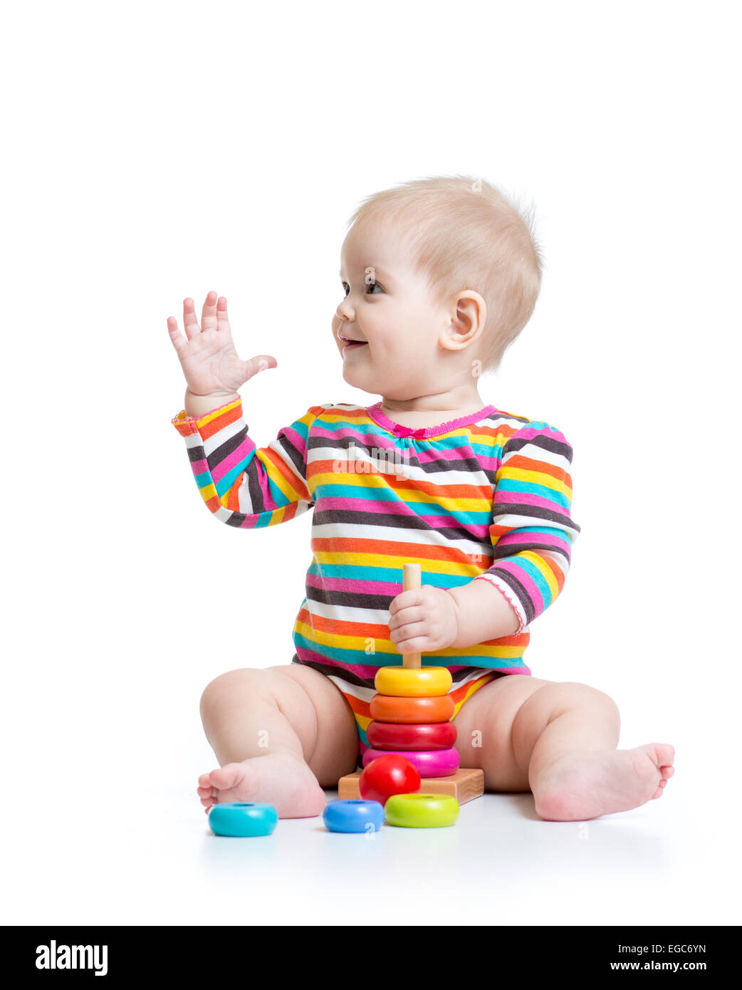 Bambina gioca con il giocattolo a piramide Foto Stock