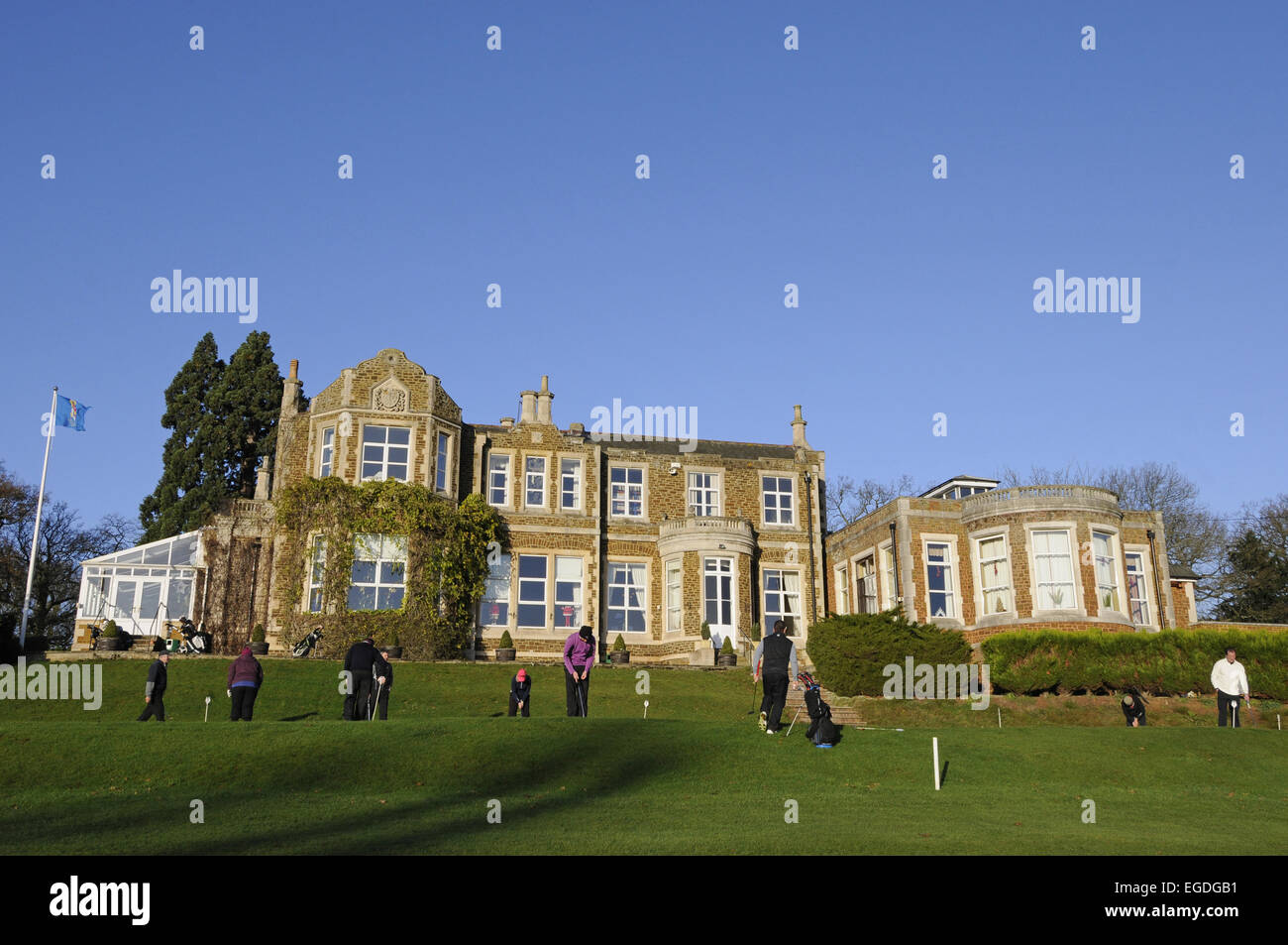 Visualizzare fino al Putting Green e la clubhouse John O'Gaunt Golf Club Sandy Bedfordshire Inghilterra Foto Stock