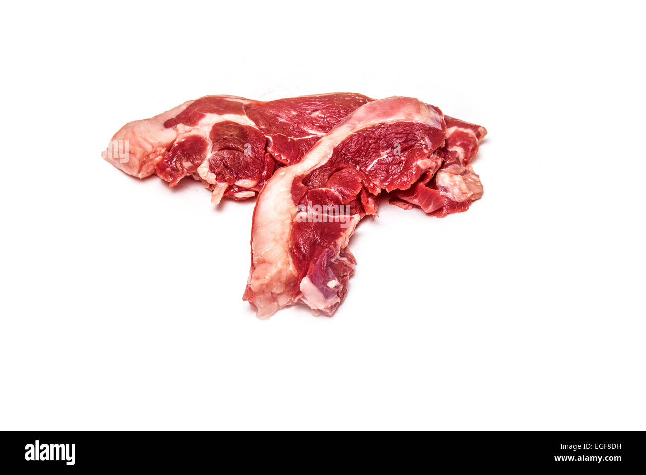 Non cotti a base di carne di capra gamba bistecche isolato su un bianco di sfondo per studio. Foto Stock