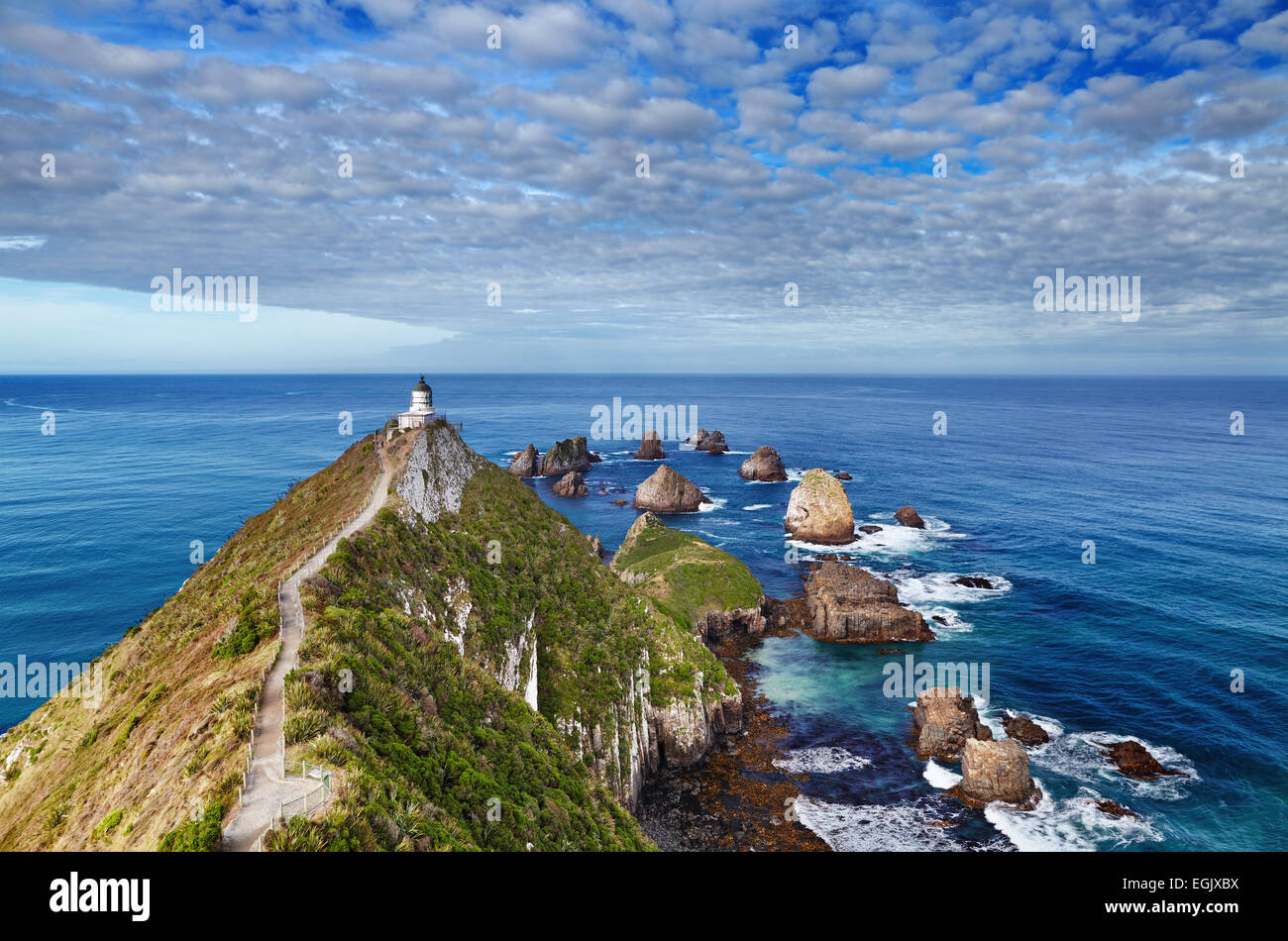 Nugget Point Lighthouse, Isola del Sud, Nuova Zelanda Foto Stock