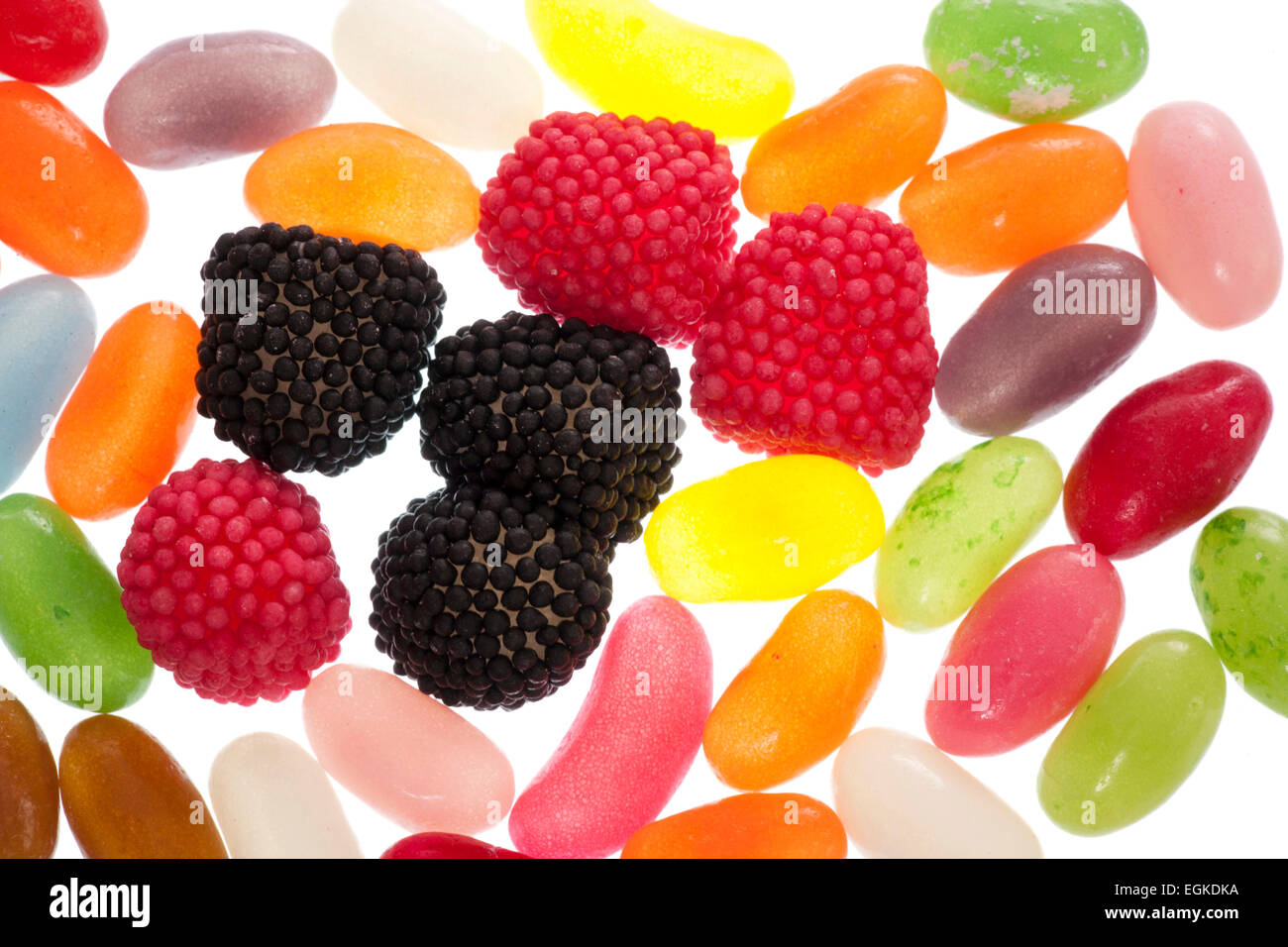Jelly bean e lampone caramelle gommose sfondo astratto Foto Stock