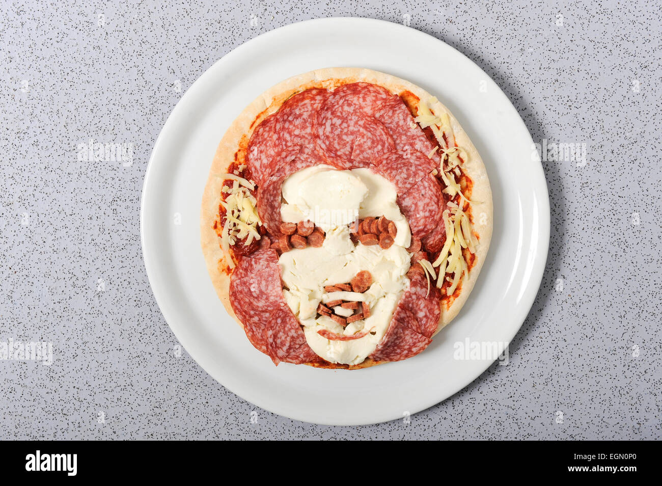 Artista di alimentare la prudenza Staite ha creato pizze di facce famose. Foto Stock