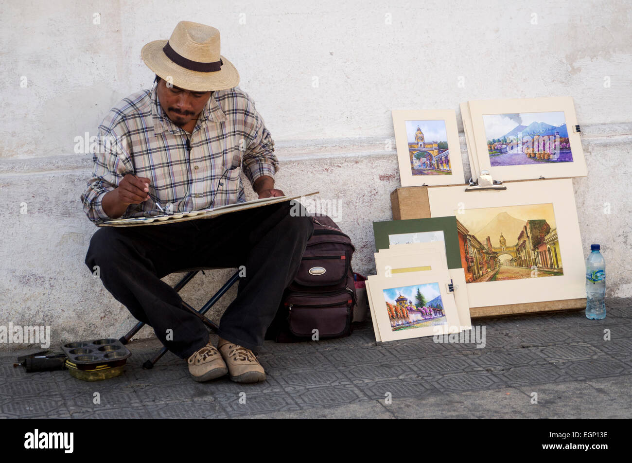 Vernici artisti nella vecchia città di Antigua, Guatemala Foto Stock
