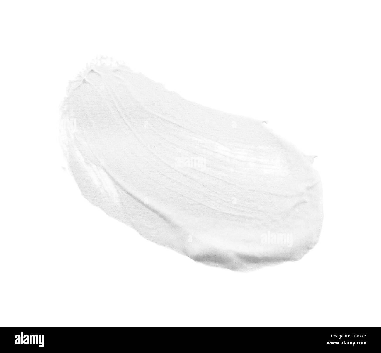 Cospargere di vernice o di crema isolato su sfondo bianco Foto Stock