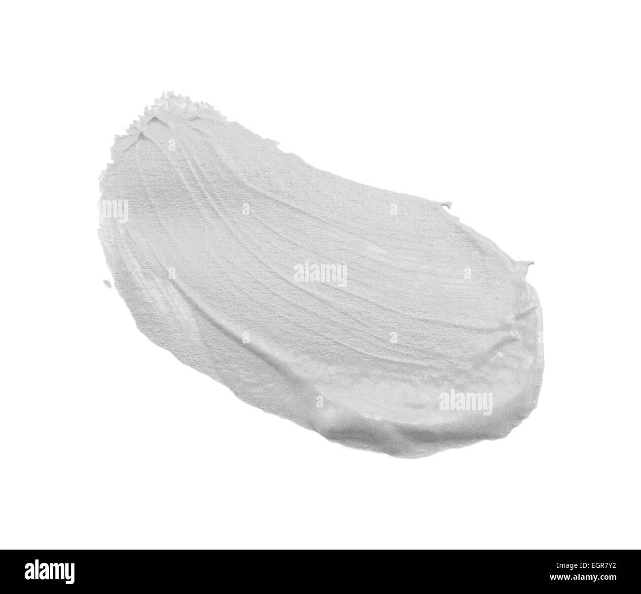 Cospargere di vernice o di crema isolato su sfondo bianco Foto Stock