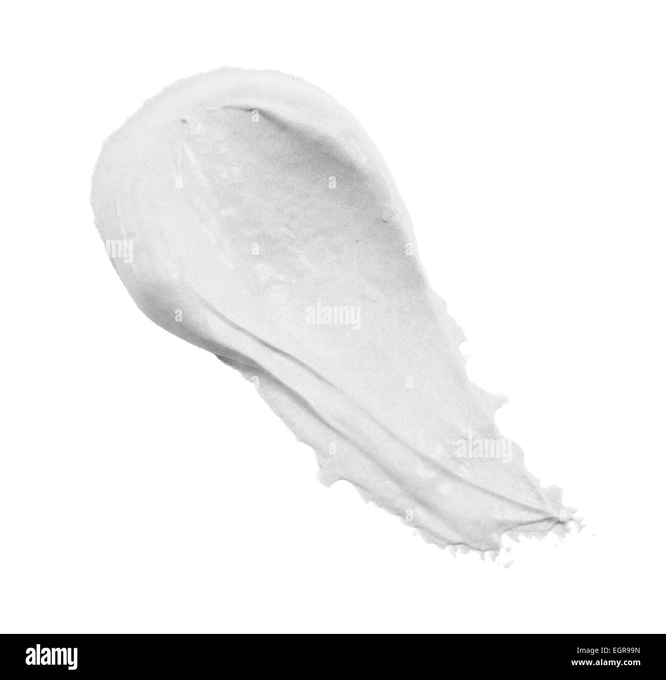 Cospargere di vernice o di crema isolato su sfondo bianco Foto Stock