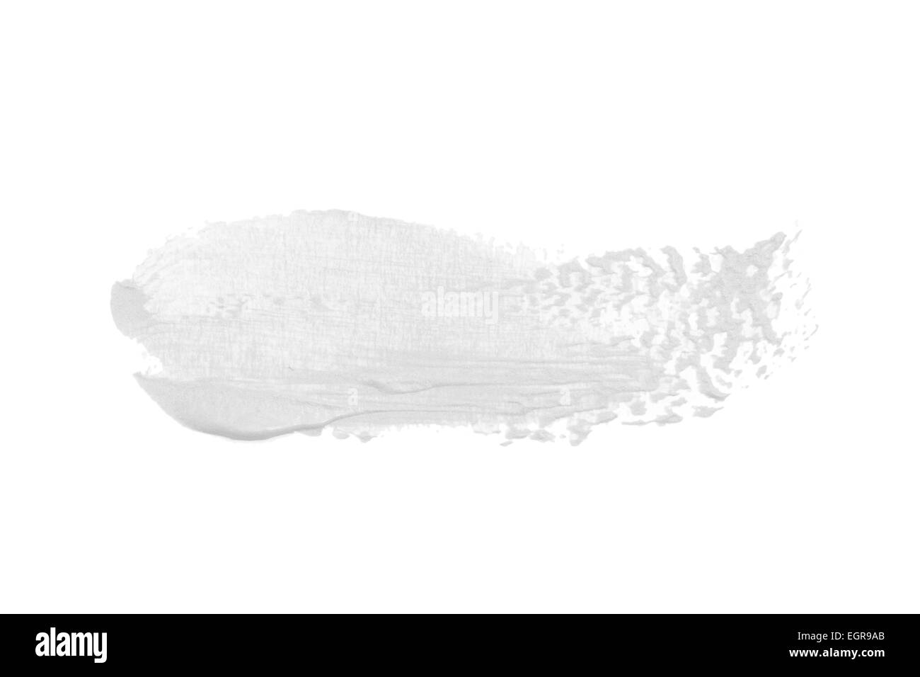 Cospargere di vernice o di crema isolato su sfondo bianco Foto Stock