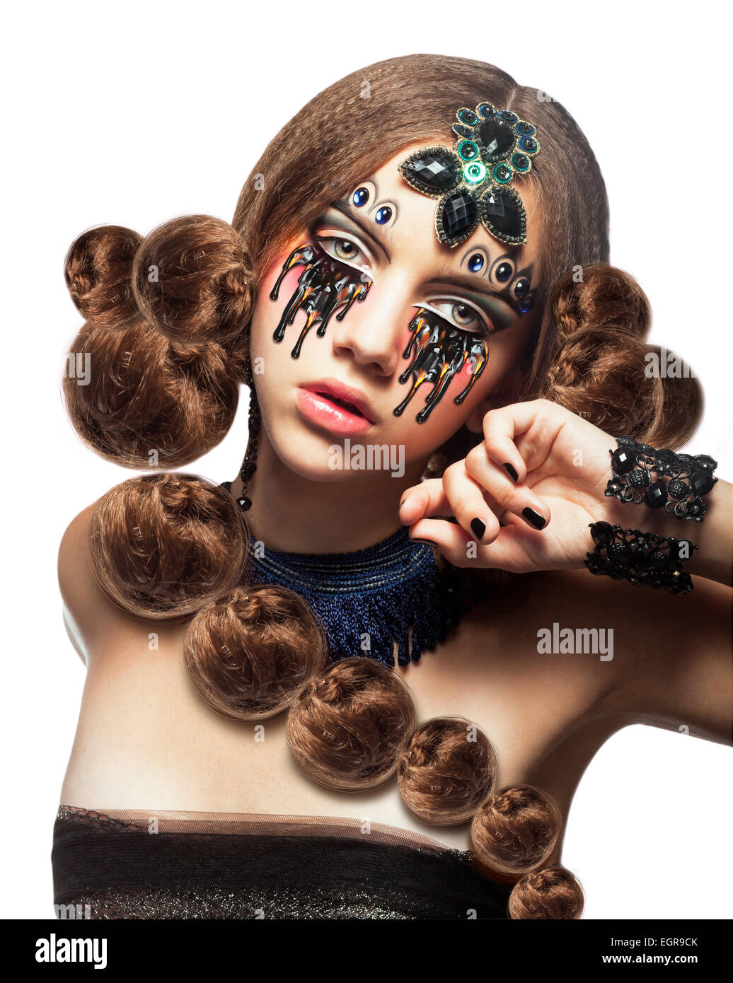 La fantasia. Donna di fantasia creativa con il trucco e lacrime Foto Stock