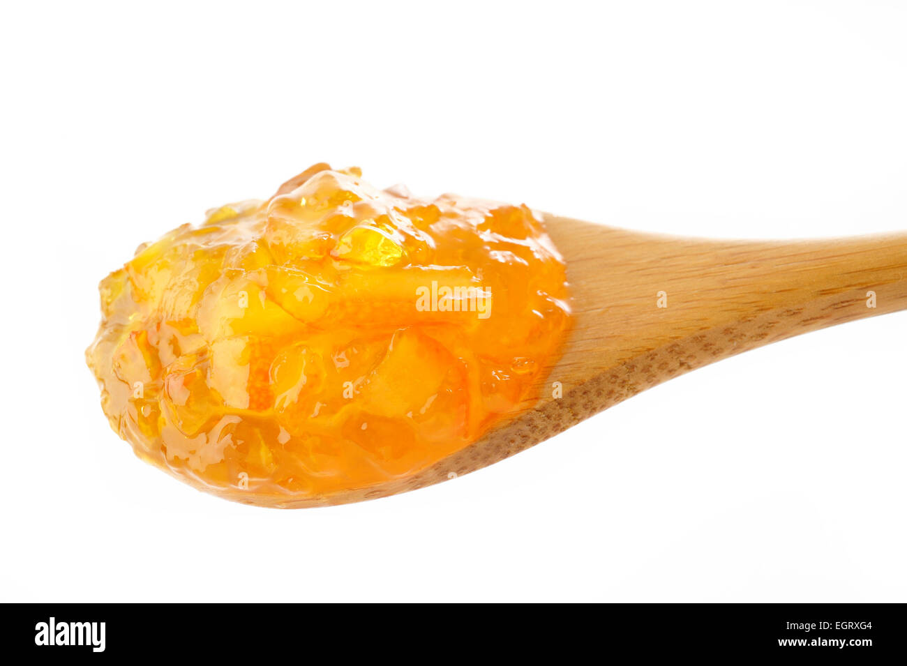 In casa arancione Inceppamento nel cucchiaio di legno Foto Stock