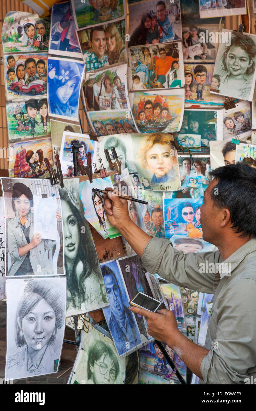 Cina, Hong Kong Kowloon, Tsim Sha Tsui, Viale delle Stelle, ritrattista Foto Stock