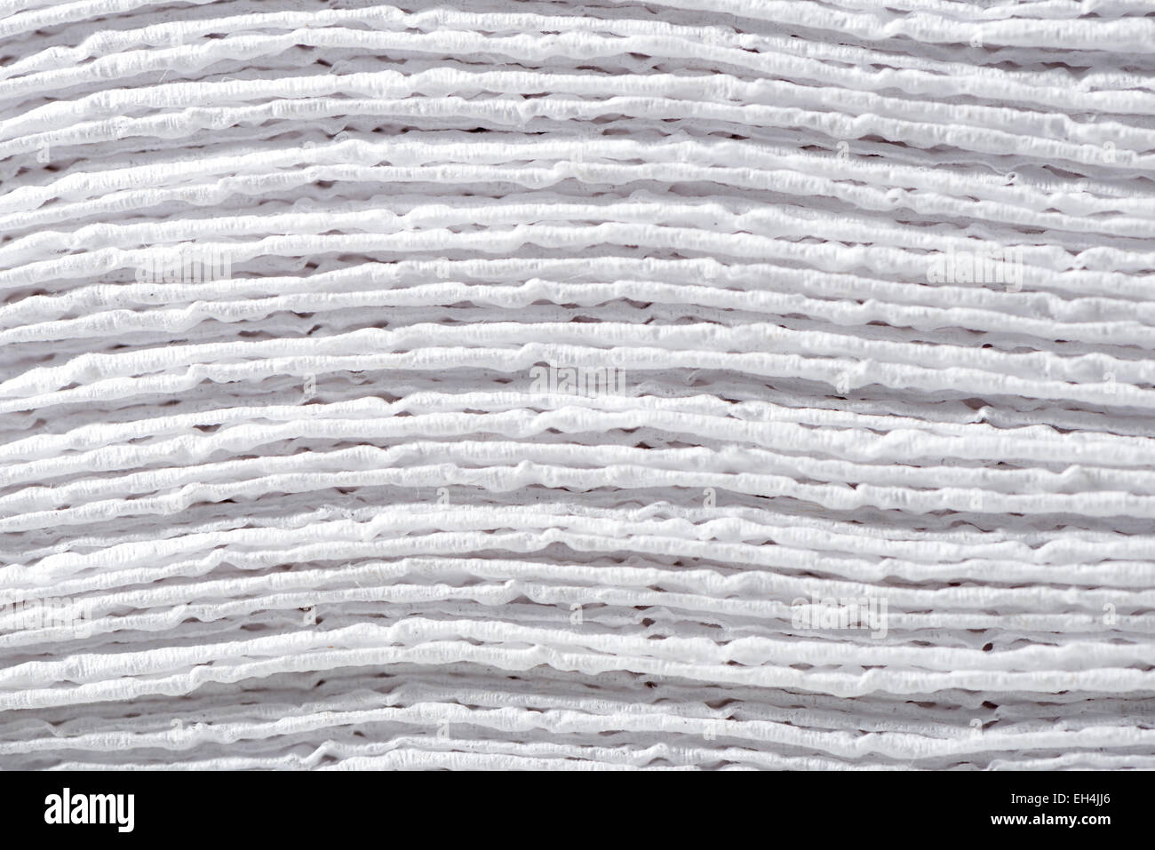 Una macro close up di una pila di tovaglioli di carta sullo sfondo Foto Stock