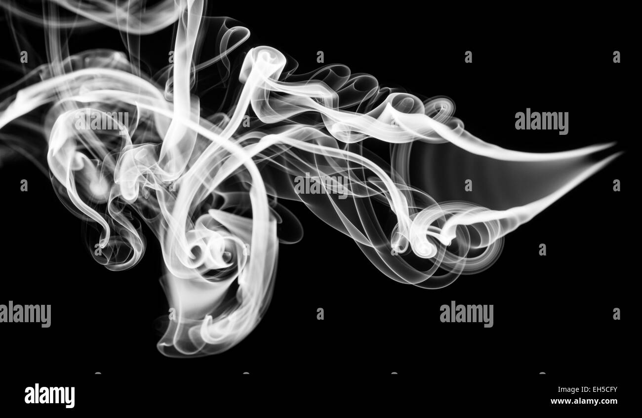 Astrazione: magic fumo bianco pattern su nero Foto Stock