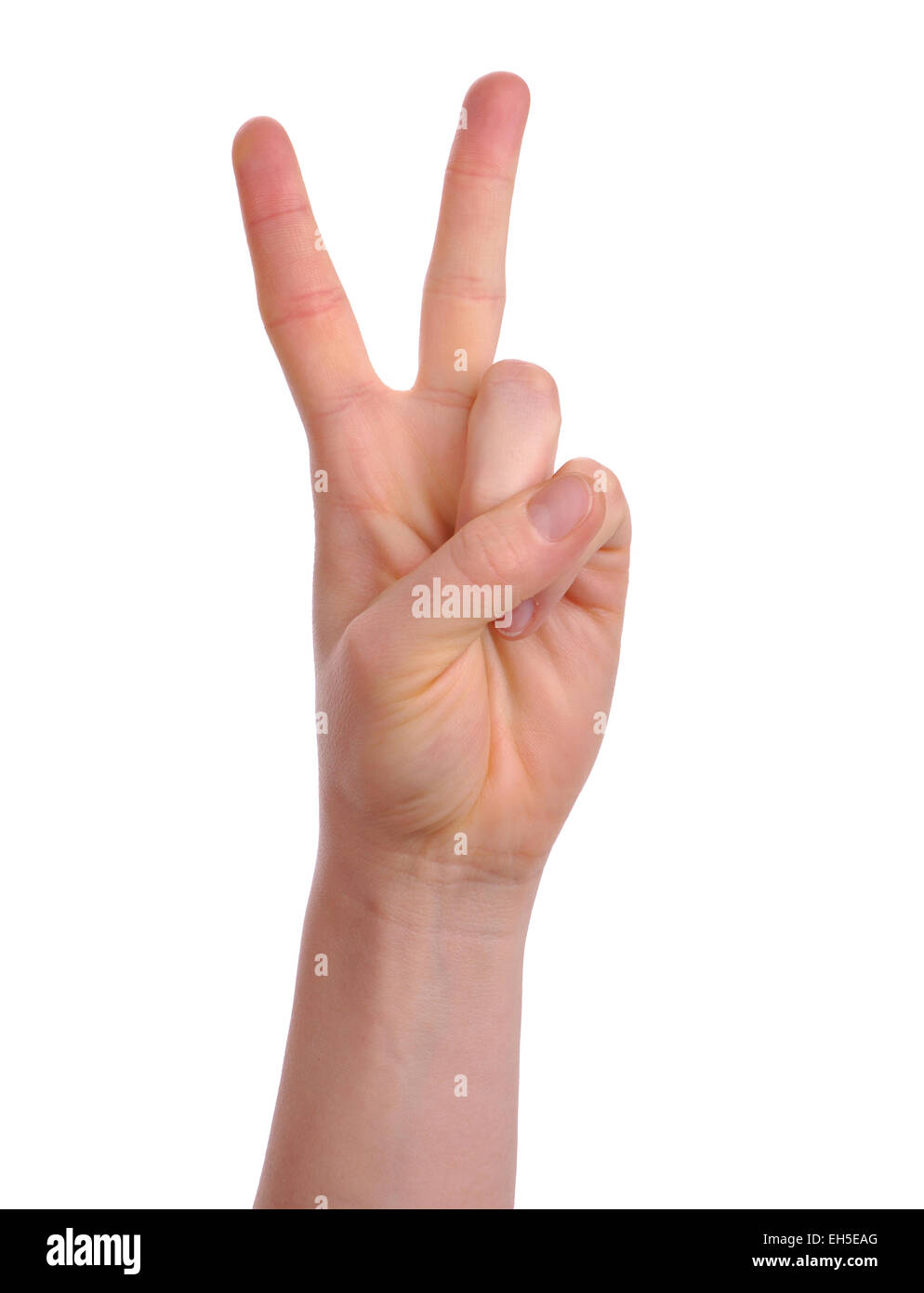 Donna di lato che mostra due dita che creano segno di vittoria Foto Stock