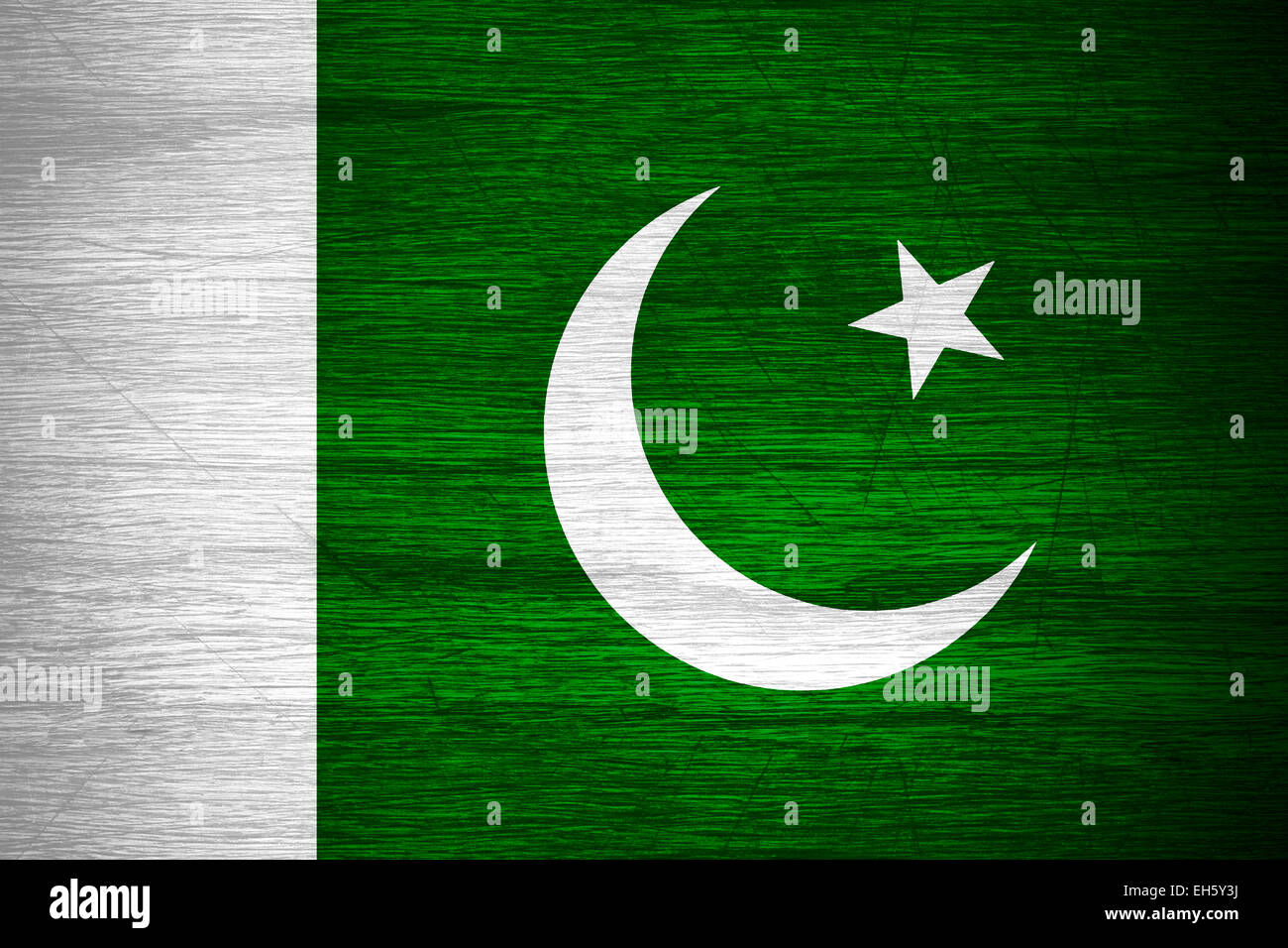 Il Pakistan bandiera o banner pakistano sulla texture in legno Foto Stock