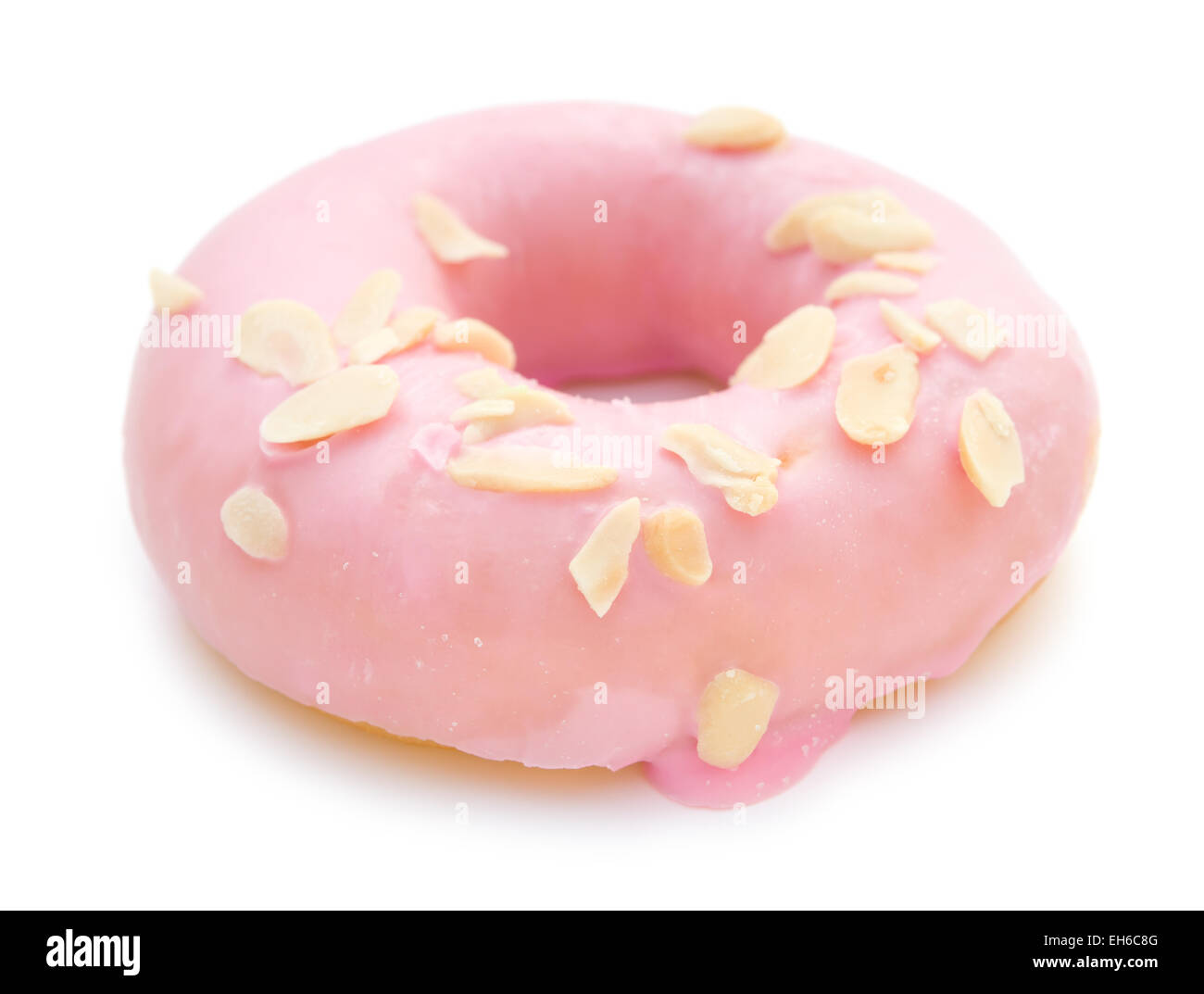 Ciambella rosa su bianco con tracciato di ritaglio Foto Stock