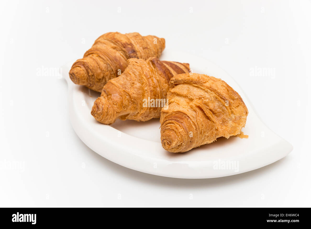 Croissant su sfondo bianco Foto Stock