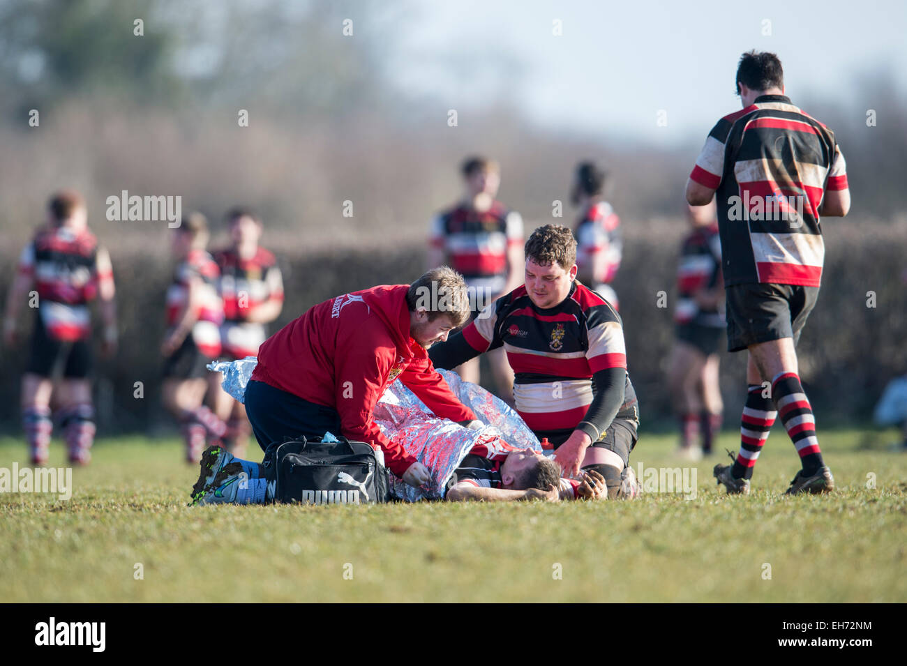 Giocatore di Rugby feriti che necessitano di ambulanza - Dorset - Inghilterra. Foto Stock