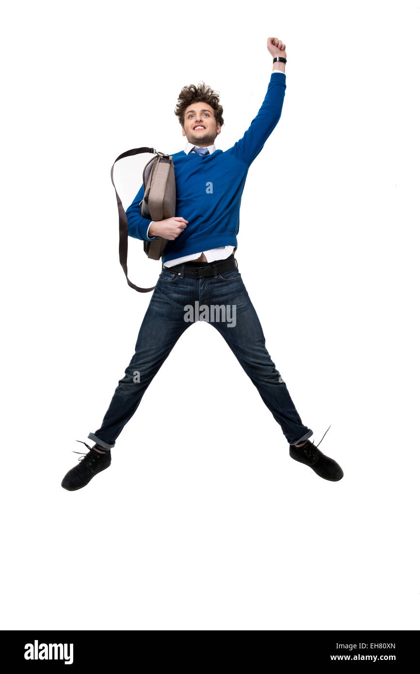 Happy business man jumping con borsa su sfondo bianco Foto Stock