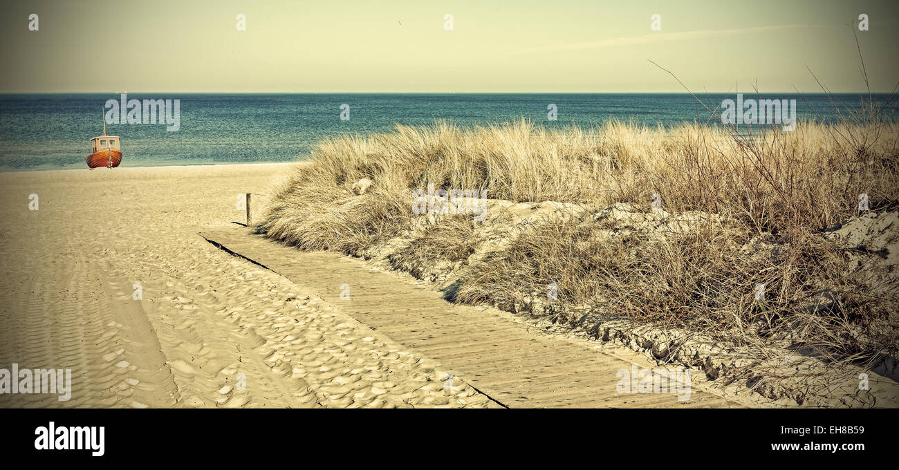 Retrò tonica foto panoramica di una spiaggia, un vecchio filtro della pellicola applicata. Foto Stock