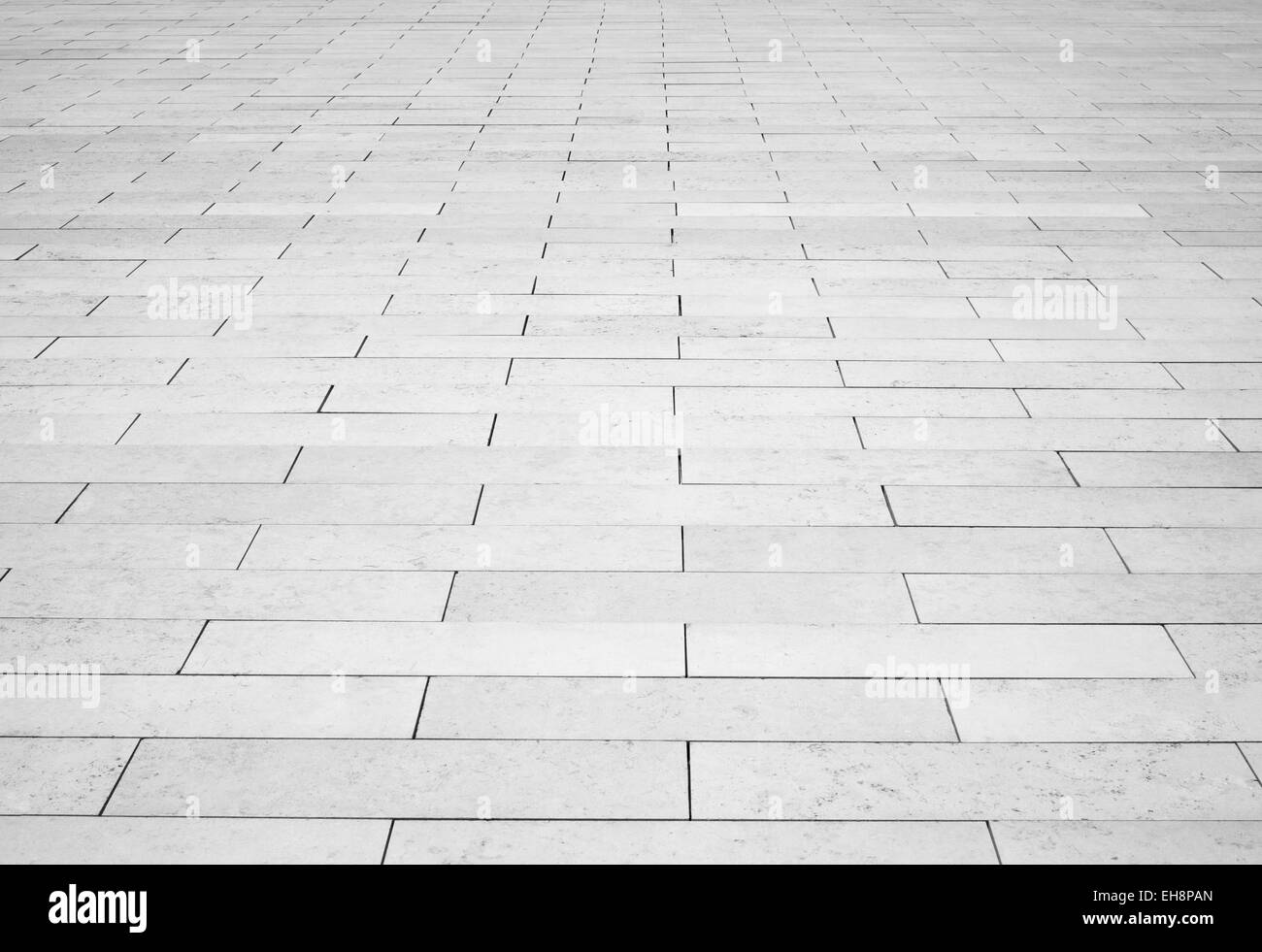 Grigio pietra mattone strada. Luce, sul marciapiede marciapiede texture Foto Stock