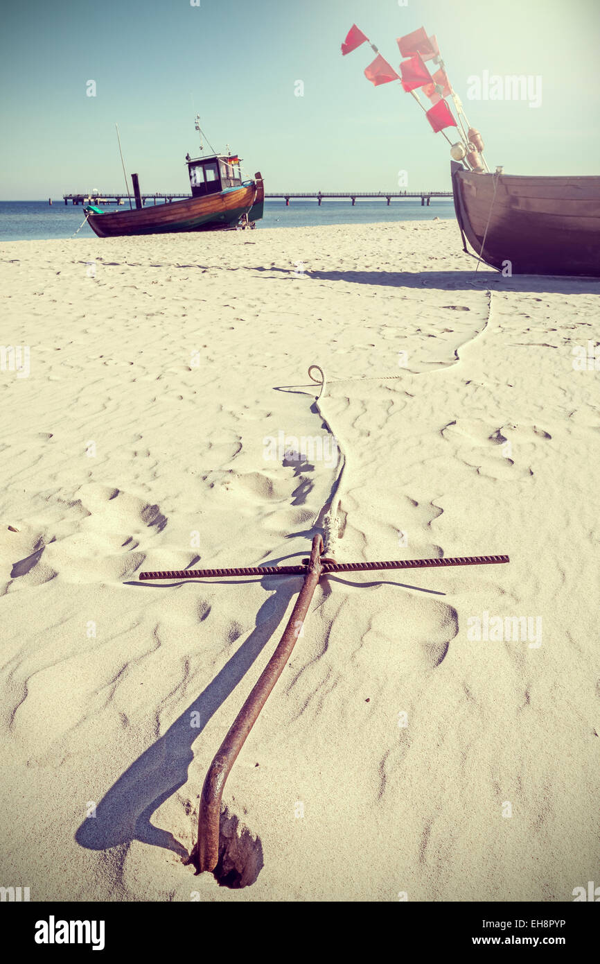 In stile retrò foto di un elemento di ancoraggio sulla spiaggia. Foto Stock