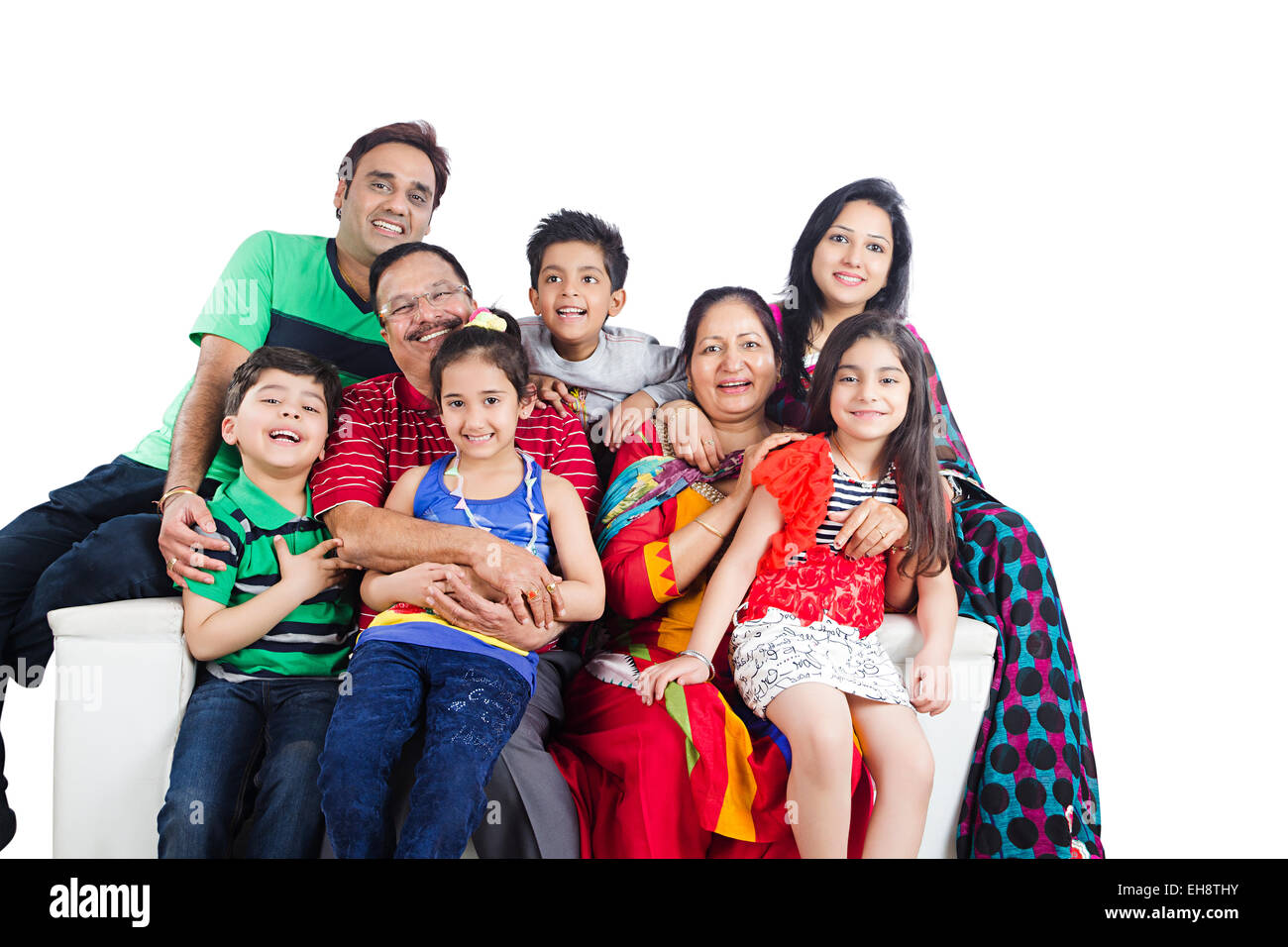 Gruppo indiano folle grand genitori famiglia comune divano Foto Stock